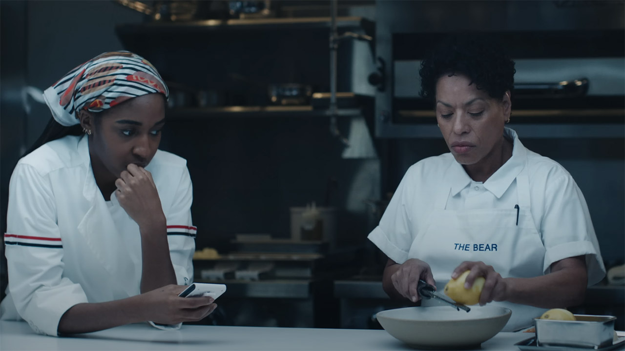 Sydney watching Tina make a meal in The Bear season 4