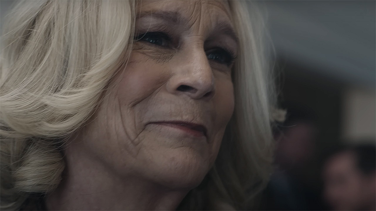 A close up of Donna looking at someone off-camera in The Bear season 4