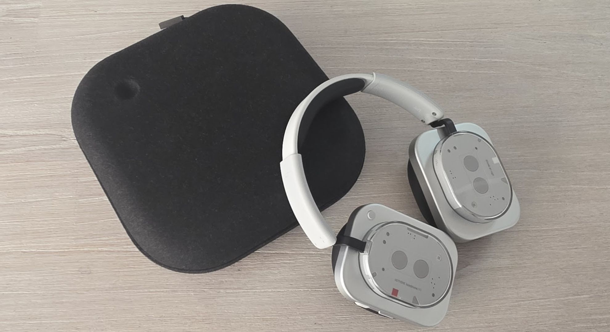 The Nothing headphone 1 lying on a travel bag