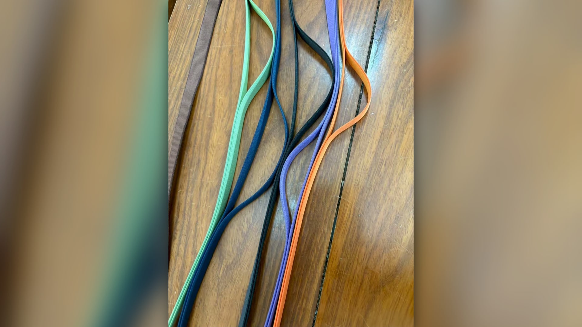 Leaked photos and renders of what is claimed to be Apple's Crossbody Strap iPhone 17 accessory.