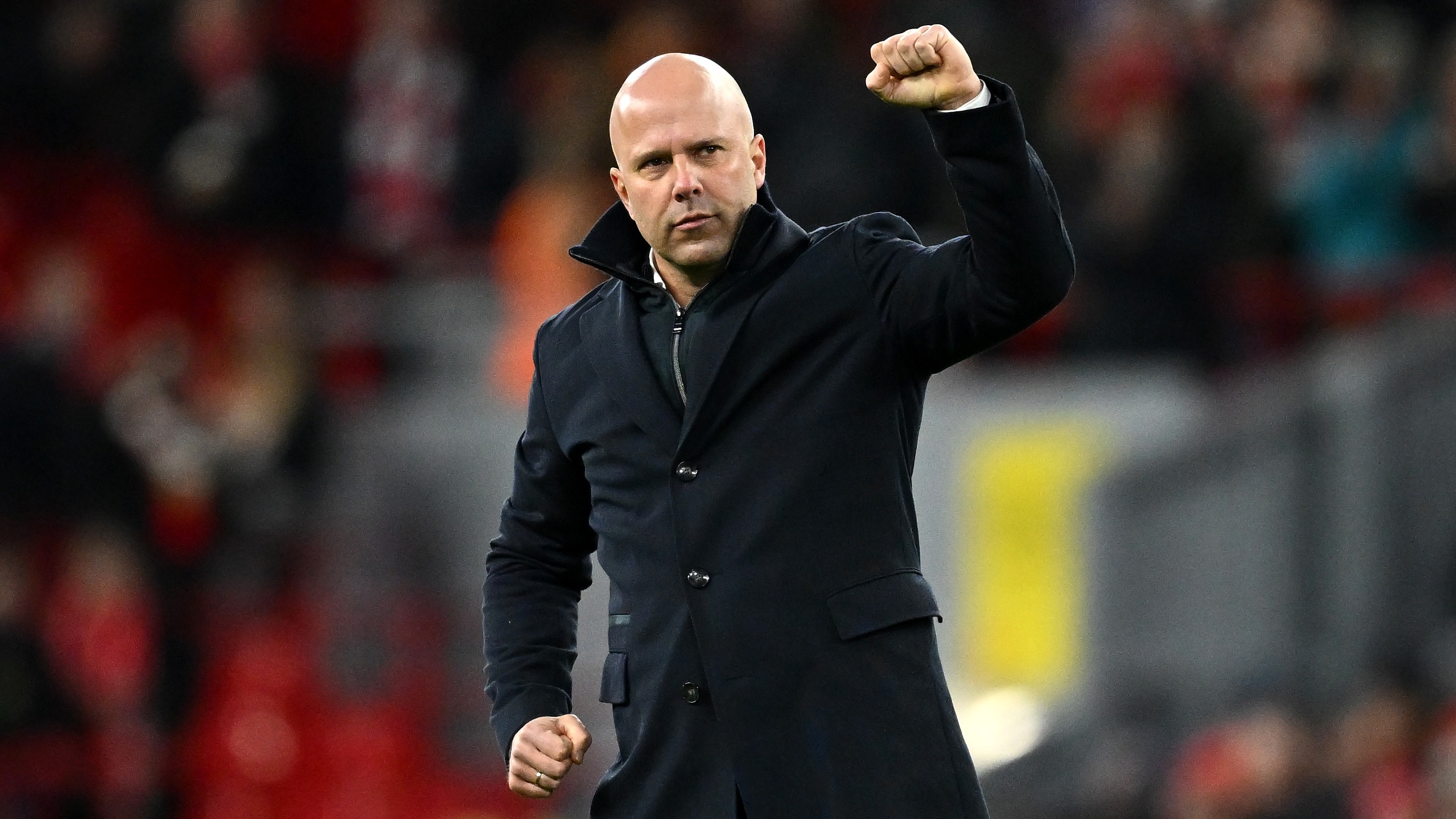 Arne Slot, Manager of Liverpool, celebrates with the fans after the team's victory during the Premier League match between Liverpool FC and Ipswich Town FC at Anfield on January 25, 2025 in Liverpool, England.