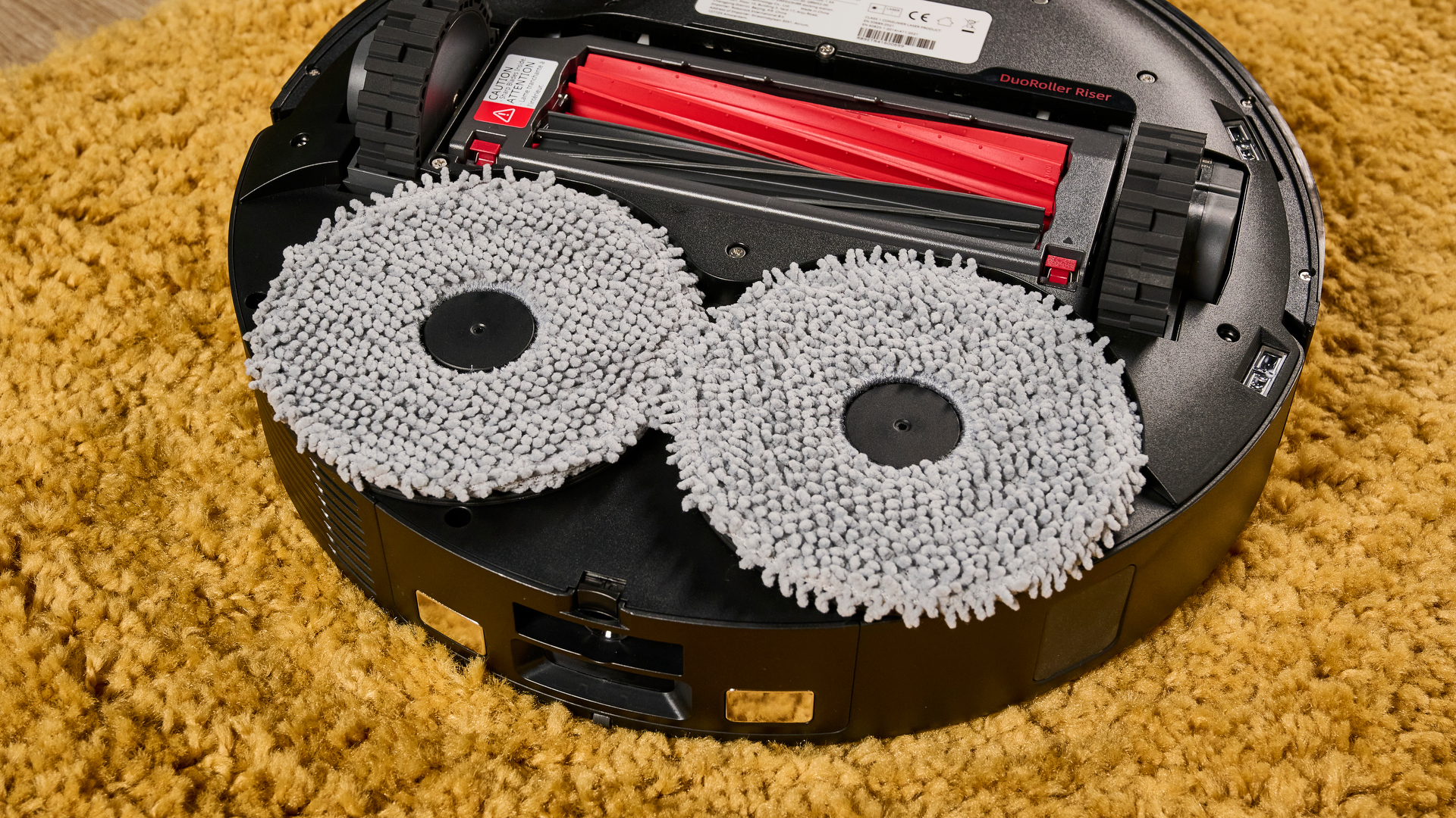 Roborock Qrevo Master robot vacuum flipped over to show underside
